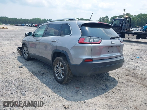 2019 Jeep Cherokee Latitude Plus with VIN 1C4PJLLB3KD184842, listed as a IAAI auction lot 42389142 with 123,324 mi miles and . Bid and sale history available at DreamBid. Image 3.