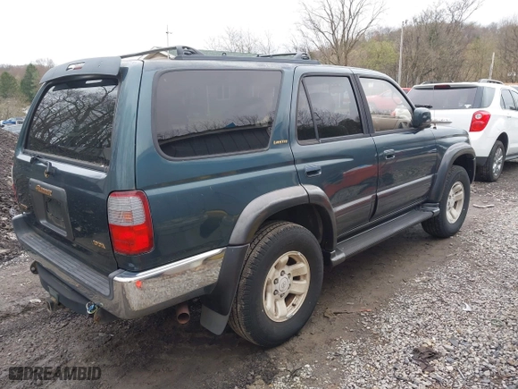 1997 Toyota 4Runner Limited with VIN JT3HN87R1V0078046, listed as a IAAI auction lot 42030550 with 163,683 mi miles. Bid and sale history available at carsss.com. Image 4.