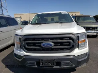 2021 Ford F-150 XL с VIN 1FTFW1CD7MFD11411, выставлен на аукционе Copart как лот 74180004 с пробегом 13 382 миль миль и Списание • Salvage title. История ставок и продаж доступна на DreamBid. Изображение 5.