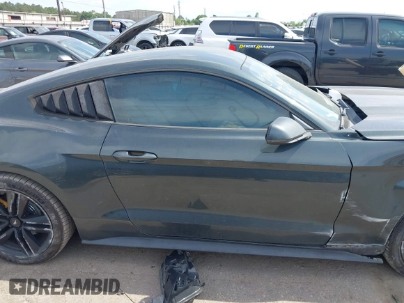 2016 Ford Mustang EcoBoost z VIN 1FA6P8TH0G5289907, wystawiony jako IAAI lot #42057565 z przebiegiem 129 917 mil mil oraz . Historia ofert i sprzedaży dostępna na DreamBid. Obrazek 13.