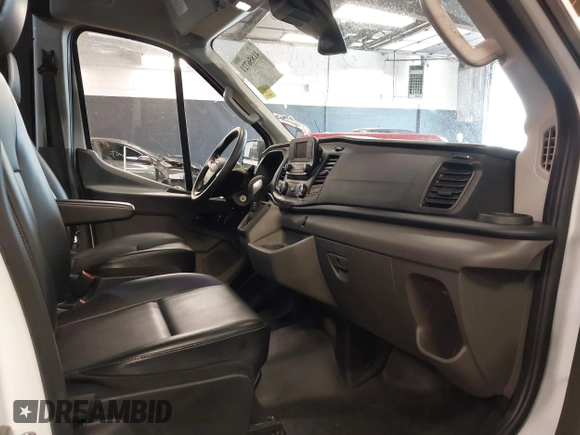2023 Ford Transit Cargo with VIN 1FTBR1C86PKB37075, listed as a IAAI auction lot 41856721 with 20,540 mi miles. Bid and sale history available at carsss.com. Image 5.
