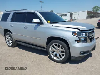 2015 Chevrolet Tahoe LT with VIN 1GNSCBKC6FR303850, listed as a IAAI auction lot 42254115 with 147,856 mi miles and . Bid and sale history available at DreamBid. Image 1.