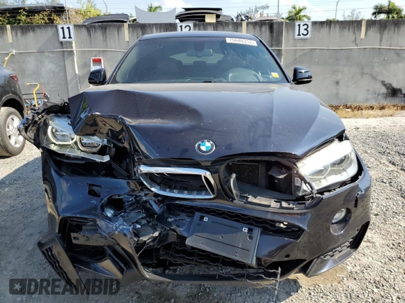 2015 BMW X6 xDrive50i with VIN 5UXKU6C50F0F94199, listed as a Copart auction lot 70680312 with 106,650 mi miles. Bid and sale history available at carsss.com. Image 5.