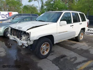 1998 Jeep Grand Cherokee Limited with VIN 1J4GZ78Y2WC164021, listed as a IAAI auction lot 42109012 with 1 mi miles. Bid and sale history available at carsss.com. Image 2.