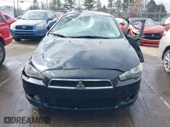 2015 Mitsubishi Lancer ES with VIN JA32U2FU4FU001543, listed as a IAAI auction lot 41710412 with 386,118 mi miles and . Bid and sale history available at DreamBid. Image 11.