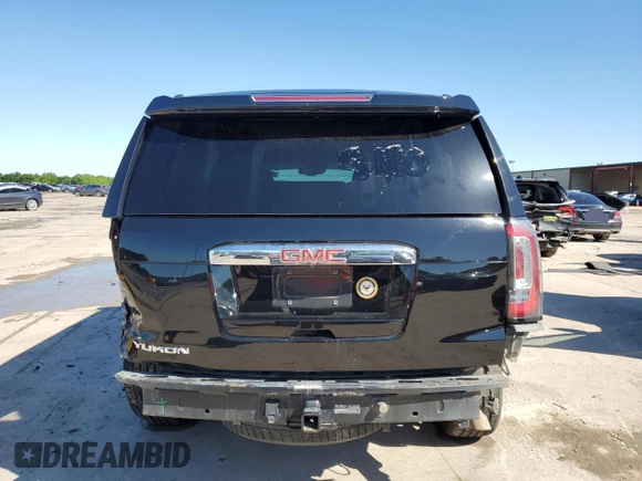 2015 GMC Yukon Denali z VIN 1GKS1CKJ8FR748131, wystawiony jako Copart lot #55213205 z przebiegiem 101 758 mil mil oraz Szkoda całkowita • Salvage title. Historia ofert i sprzedaży dostępna na DreamBid. Obrazek 6.
