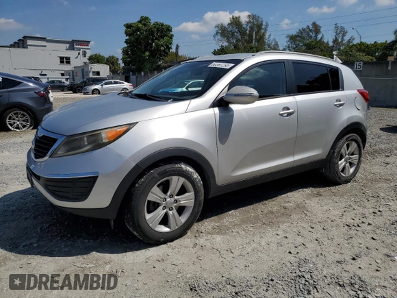 2013 Kia Sportage LX with VIN KNDPB3A26D7429389, listed as a Copart auction lot 50597295 with 217,197 mi miles and Salvage Title. Bid and sale history available at carsss.com. Image 1.