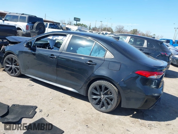 2021 Toyota Corolla SE with VIN 5YFS4MCE7MP064608, listed as a IAAI auction lot 41665091 with 59,697 mi miles. Bid and sale history available at carsss.com. Image 3.