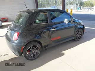 2015 FIAT 500 Turbo with VIN 3C3CFFHH2FT509287, listed as a IAAI auction lot 42030972 with 112,029 mi miles. Bid and sale history available at carsss.com. Image 4.