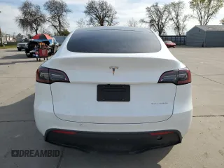2023 Tesla Model Y Long Range z VIN 7SAYGDEE2PA065048, wystawiony jako Copart lot #48403655 z przebiegiem 56 553 mil mil oraz Szkoda całkowita • Salvage title. Historia ofert i sprzedaży dostępna na DreamBid. Obrazek 6.