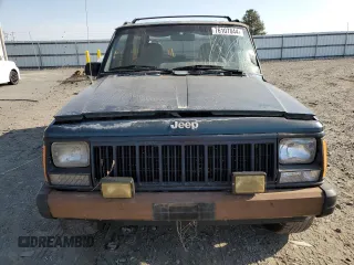 1995 Jeep Cherokee Sport with VIN 1J4FJ67S4SL519629, listed as a Copart auction lot 76107844 with 312,532 mi miles and Salvage Title. Bid and sale history available at carsss.com. Image 5.