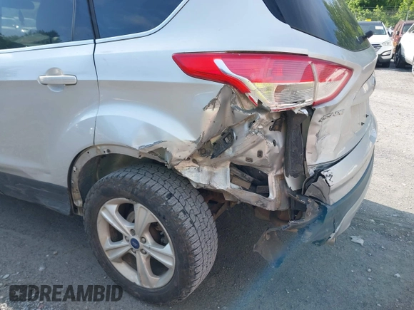 2013 Ford Escape SE z VIN 1FMCU0GX5DUC72347, wystawiony jako IAAI lot #42370050 z przebiegiem 167 212 mil mil oraz . Historia ofert i sprzedaży dostępna na DreamBid. Obrazek 6.