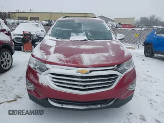 2021 Chevrolet Equinox Premier z VIN 2GNAXXEV4M6105996, wystawiony jako IAAI lot #41402065 z przebiegiem 51 083 mil mil oraz . Historia ofert i sprzedaży dostępna na DreamBid. Obrazek 13.