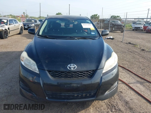 2009 Toyota Matrix with VIN 2T1KU40E69C091858, listed as a IAAI auction lot 41925490 with 153,161 mi miles. Bid and sale history available at carsss.com. Image 12.