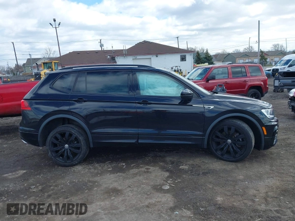 2021 Volkswagen Tiguan SE with VIN 3VV2B7AX1MM101432, listed as a IAAI auction lot 41982286 with 72,252 mi miles and . Bid and sale history available at DreamBid. Image 13.