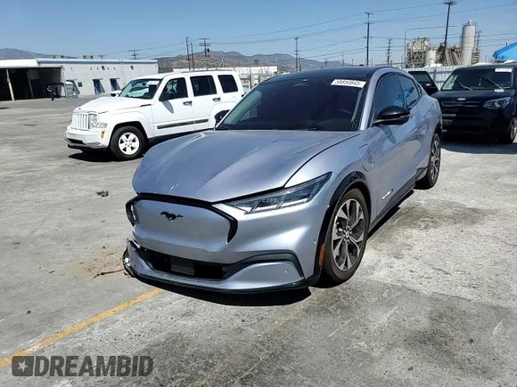 2022 Ford Mustang Mach-E Premium z VIN 3FMTK3R70NMA26901, wystawiony jako Copart lot #58850845 z przebiegiem 24 837 mil mil oraz Szkoda całkowita • Salvage title. Historia ofert i sprzedaży dostępna na DreamBid. Obrazek 14.