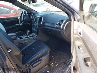 2018 Jeep Grand Cherokee Laredo E with VIN 1C4RJFAG2JC420927, listed as a IAAI auction lot 41962579 with 90,898 mi miles. Bid and sale history available at carsss.com. Image 5.