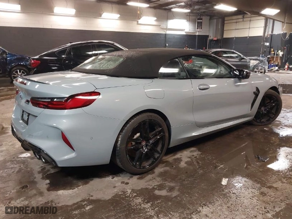 2023 BMW M8 Competition with VIN WBSDZ0C02PCM75573, listed as a IAAI auction lot 41618692 with 8,292 mi miles. Bid and sale history available at carsss.com. Image 4.