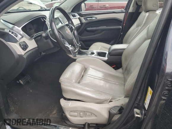 2014 Cadillac SRX Performance Collection with VIN 3GYFNFE38ES647063, listed as a Copart auction lot 55166145 with 161,472 mi miles and Salvage title. Bid and sale history available at DreamBid. Image 7.