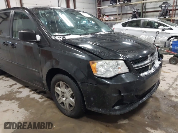 2012 Dodge Grand Caravan SE with VIN 2C4RDGBG8CR155758, listed as a IAAI auction lot 41300951 with 126,209 mi miles and . Bid and sale history available at DreamBid. Image 6.