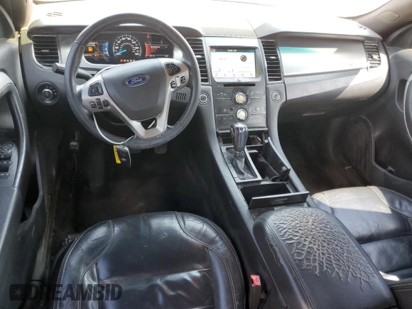 2017 Ford Taurus SEL with VIN 1FAHP2E81HG133593, listed as a Copart auction lot 51595035 with 255,567 mi miles and Salvage Title. Bid and sale history available at DreamBid. Image 8.