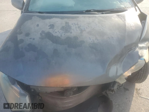 2010 Honda Insight EX with VIN JHMZE2H72AS025427, listed as a Copart auction lot 54983775 with 184,052 mi miles and Salvage Title. Bid and sale history available at DreamBid. Image 11.