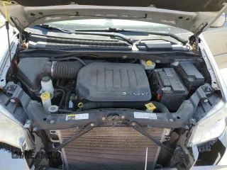 2013 Dodge Grand Caravan Crew with VIN 2C4RDGDG4DR726502, listed as a Copart auction lot 53258075 with 132,903 mi miles and Salvage Title. Bid and sale history available at DreamBid. Image 14.