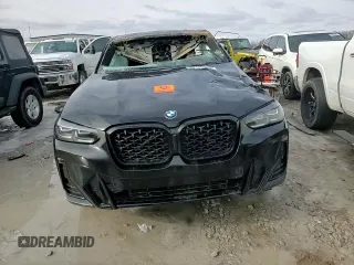 2024 BMW X4 xDrive30i z VIN 5UX33DT02R9U91458, wystawiony jako Copart lot #89126955 z przebiegiem Nie podano mil oraz Szkoda całkowita • Salvage title. Historia ofert i sprzedaży dostępna na DreamBid. Obrazek 12.