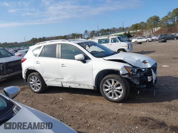 2014 Mazda CX-5 Grand Touring with VIN JM3KE4DY7E0425201, listed as a IAAI auction lot 41803597 with 118,867 mi miles. Bid and sale history available at carsss.com. Image 14.