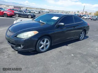2004 Toyota Camry Solara SE with VIN 4T1CA38P24U015266, listed as a IAAI auction lot 41976105 with 221,942 mi miles. Bid and sale history available at carsss.com. Image 2.