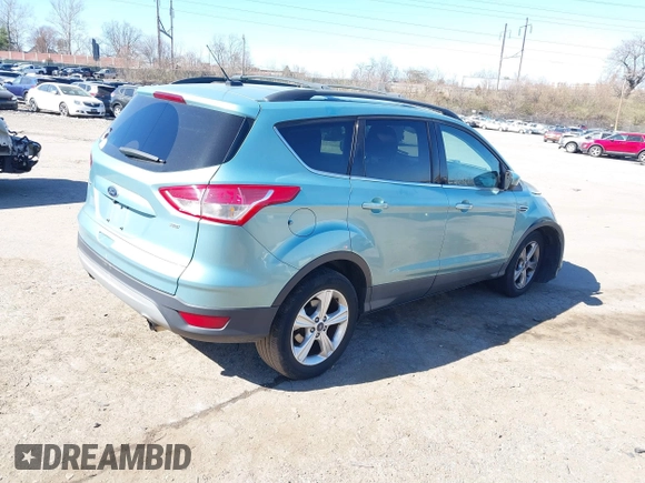 2013 Ford Escape SE with VIN 1FMCU9GX3DUB67956, listed as a IAAI auction lot 41901607 with 102,499 mi miles. Bid and sale history available at carsss.com. Image 4.