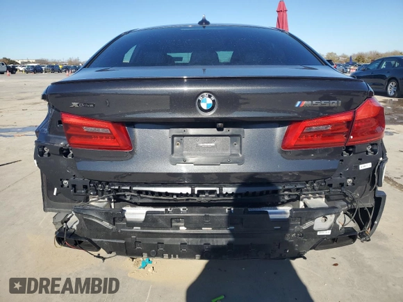 2020 BMW 5 Series M550i xDrive with VIN WBAJS7C07LCD97275, listed as a Copart auction lot 85764434 with Not provided miles and Clean title. Bid and sale history available at DreamBid. Image 6.