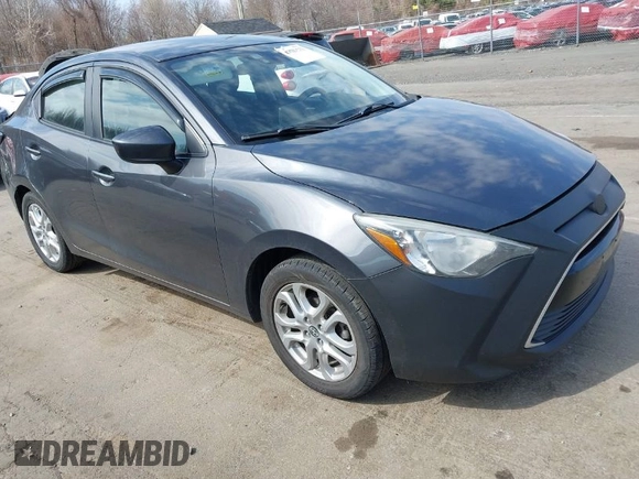 2016 Scion iA with VIN 3MYDLBZV2GY129703, listed as a IAAI auction lot 41787371 with 77,459 mi miles. Bid and sale history available at carsss.com. Image 1.