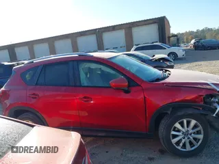 2015 Mazda CX-5 Touring with VIN JM3KE4CY6F0455468, listed as a IAAI auction lot 40669780 with 225,831 mi miles and . Bid and sale history available at carsss.com. Image 14.