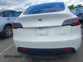 2022 Tesla Model Y Long Range z VIN 7SAYGDEE6NF419332, wystawiony jako IAAI lot #42020974 z przebiegiem 55 680 mil mil oraz . Historia ofert i sprzedaży dostępna na DreamBid. Obrazek 16.