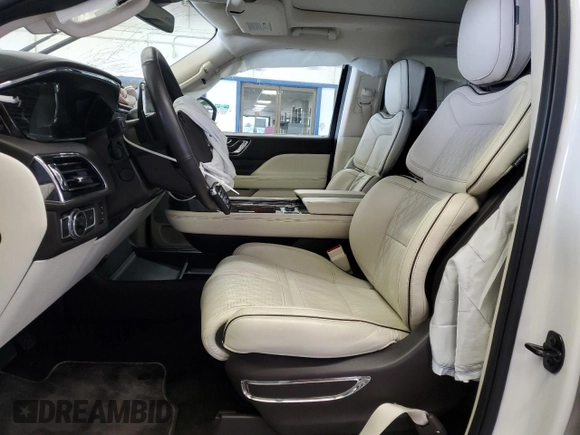 2020 Lincoln Navigator Black Label z VIN 5LMJJ3TT5LEL23937, wystawiony jako Copart lot #54434155 z przebiegiem 22 437 mil mil oraz Szkoda całkowita • Salvage title. Historia ofert i sprzedaży dostępna na DreamBid. Obrazek 7.