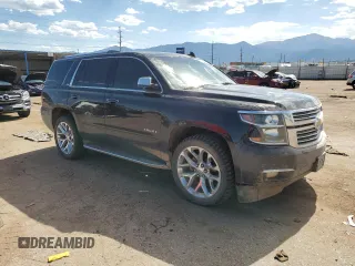 2016 Chevrolet Tahoe LTZ with VIN 1GNSKCKC6GR470137, listed as a Copart auction lot 61127585 with 134,015 mi miles and Clean title. Bid and sale history available at DreamBid. Image 4.