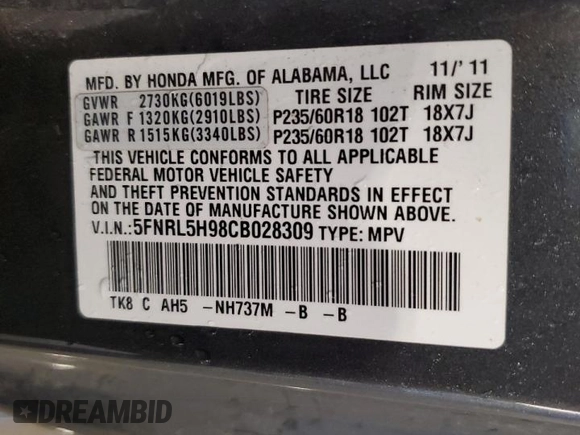 2012 Honda Odyssey Touring with VIN 5FNRL5H98CB028309, listed as a Copart auction lot 57663485 with 233,921 mi miles and Salvage title. Bid and sale history available at DreamBid. Image 13.
