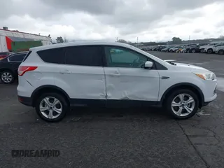 2013 Ford Escape SE with VIN 1FMCU9G93DUA17816, listed as a IAAI auction lot 41688140 with 129,738 mi miles. Bid and sale history available at carsss.com. Image 13.