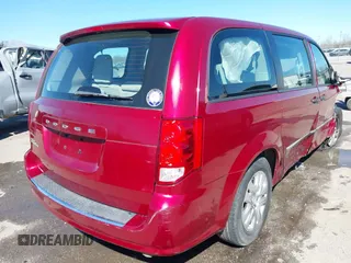 2014 Dodge Grand Caravan American Value with VIN 2C4RDGBG6ER223820, listed as a IAAI auction lot 41705097 with 213,180 mi miles and . Bid and sale history available at DreamBid. Image 4.