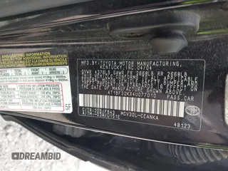 2004 Toyota Camry LE with VIN 4T1BF32KX4U077010, listed as a IAAI auction lot 42039297 with 113,742 mi miles. Bid and sale history available at carsss.com. Image 9.