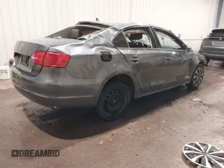 2014 Volkswagen Jetta SE with VIN 3VWD17AJ9EM206448, listed as a IAAI auction lot 42230731 with 144,159 mi miles and . Bid and sale history available at DreamBid. Image 4.