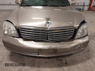 2004 Cadillac DeVille z VIN 1G6KD54Y04U119341, wystawiony jako IAAI lot #42193664 z przebiegiem 162 290 mil mil oraz . Historia ofert i sprzedaży dostępna na DreamBid. Obrazek 6.