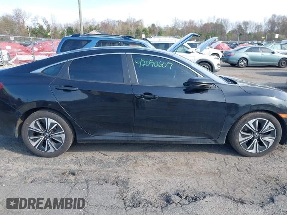 2016 Honda Civic Sedan EX-L with VIN 2HGFC1F77GH636904, listed as a IAAI auction lot 42090609 with 176,968 mi miles. Bid and sale history available at carsss.com. Image 13.