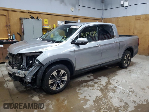 2017 Honda Ridgeline RTL-E with VIN 5FPYK3F71HB030020, listed as a Copart auction lot 82834683 with 102,111 mi miles and Salvage title. Bid and sale history available at DreamBid. Image 1.
