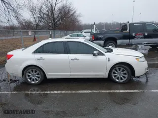 2012 Lincoln MKZ with VIN 3LNHL2JCXCR813912, listed as a IAAI auction lot 41560299 with 153,806 mi miles. Bid and sale history available at carsss.com. Image 13.