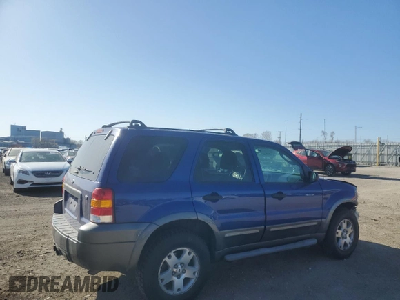 2006 Ford Escape XLT with VIN 1FMYU93136KA51162, listed as a Copart auction lot 52239385 with 227,666 mi miles and Salvage title. Bid and sale history available at DreamBid. Image 3.