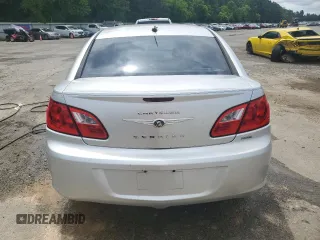 2009 Chrysler Sebring Touring z VIN 1C3LC56B39N501219, wystawiony jako Copart lot #56197905 z przebiegiem 138 442 mil mil oraz Szkoda całkowita • Salvage title. Historia ofert i sprzedaży dostępna na DreamBid. Obrazek 6.