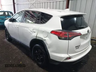 2018 Toyota RAV4 LE with VIN 2T3ZFREV6JW505455, listed as a IAAI auction lot 42052207 with 122,745 mi miles. Bid and sale history available at carsss.com. Image 3.