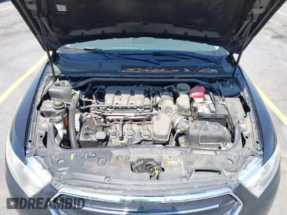 2015 Ford Taurus Limited with VIN 1FAHP2J81FG134973, listed as a IAAI auction lot 41845384 with 139,203 mi miles. Bid and sale history available at carsss.com. Image 10.